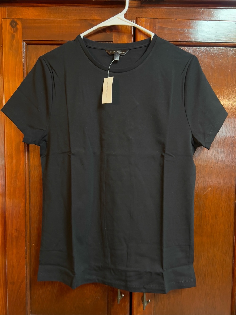 Women’s size large short sleeve fitted tiny black T-shirt